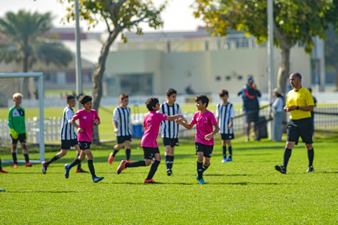 children playing soccer